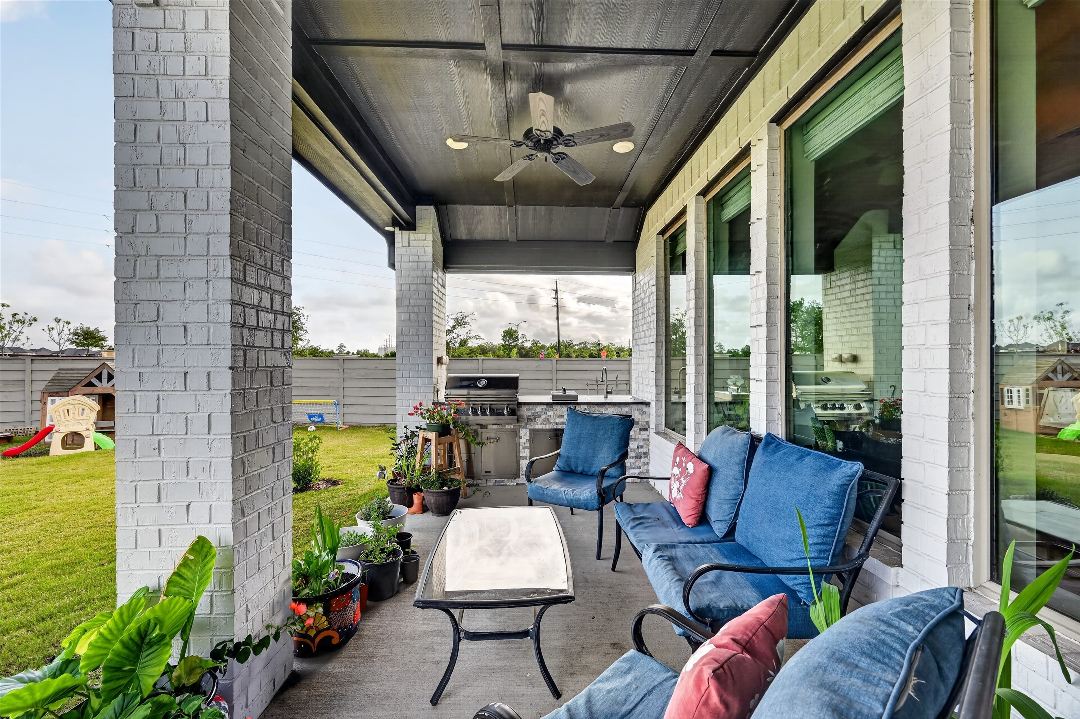 4731 Cedar Butte Lane Manvel, TX 77578 - Photo 37 of 42 a outdoor living space with furniture and garden view