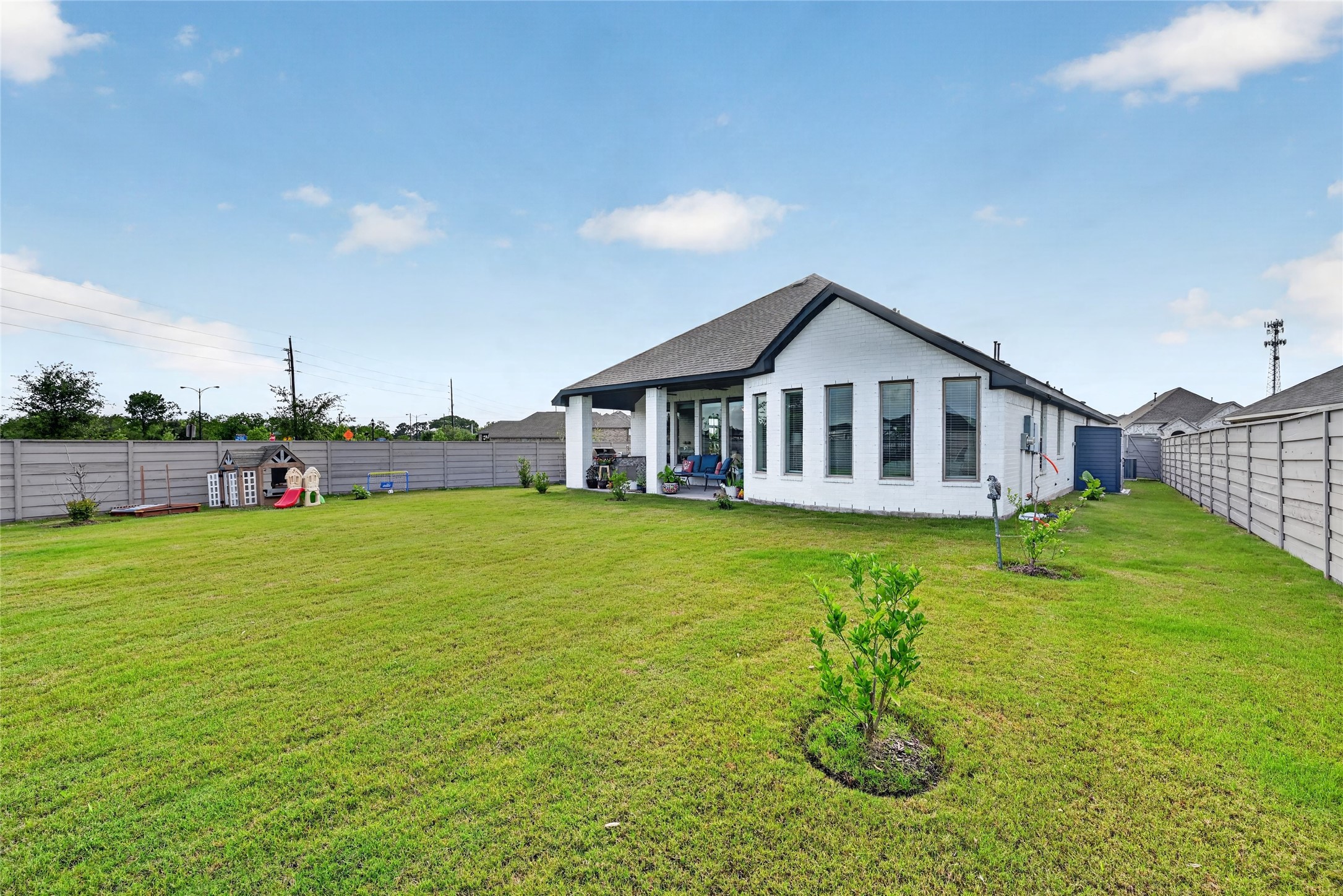 4731 Cedar Butte Lane Manvel, TX 77578 - Photo 41 of 42 a house with swimming pool in front of it
