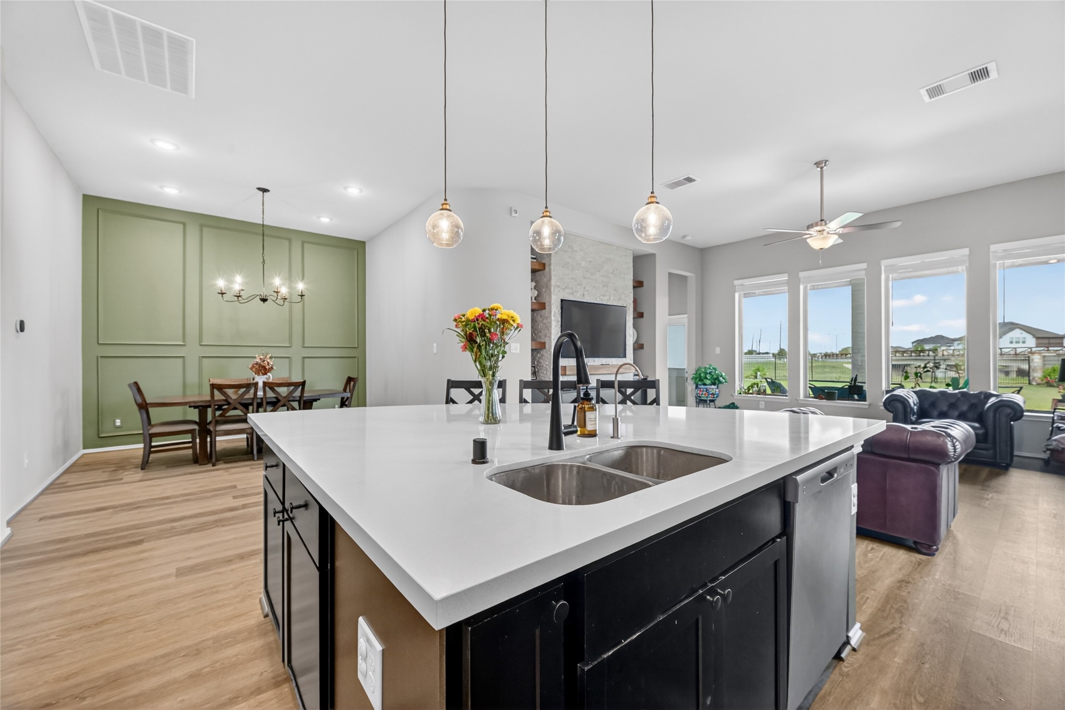 4731 Cedar Butte Lane Manvel, TX 77578 - Photo 10 of 42 a kitchen with counter top space appliances and a wooden floor