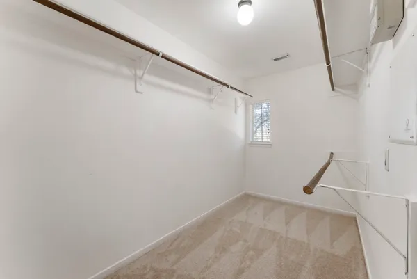 a view of a room with racks on the wall