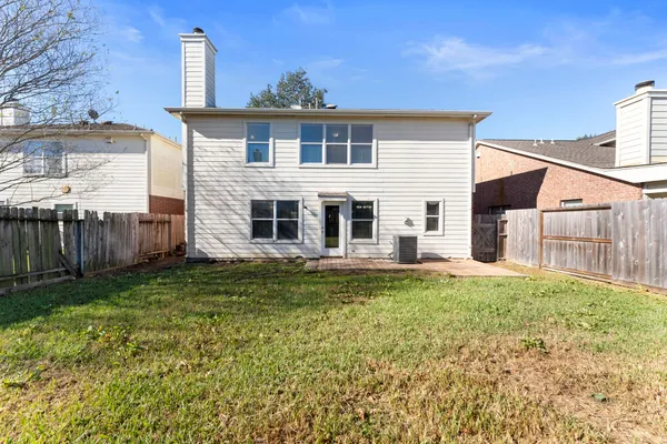 a house view with a garden space