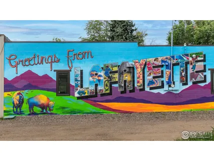 a view of swimming pool with outdoor seating