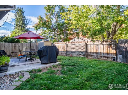 a garden view with a seating space