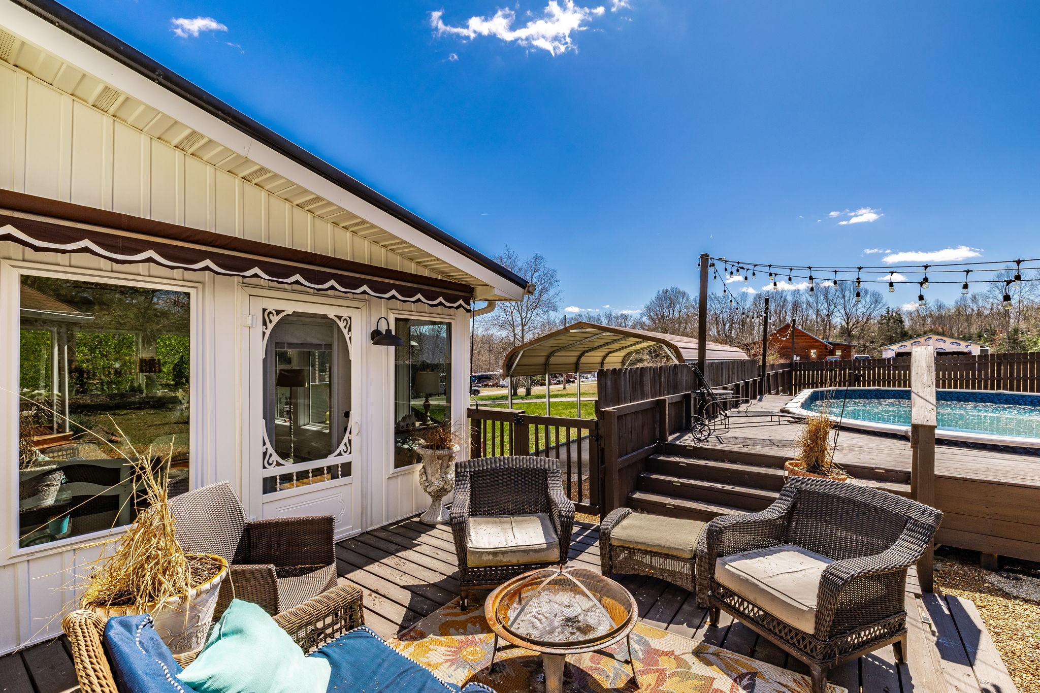 6761 Hall Road Greenbrier, TN 37073 - Photo 28 of 85 a view of a chairs and tables in the patio