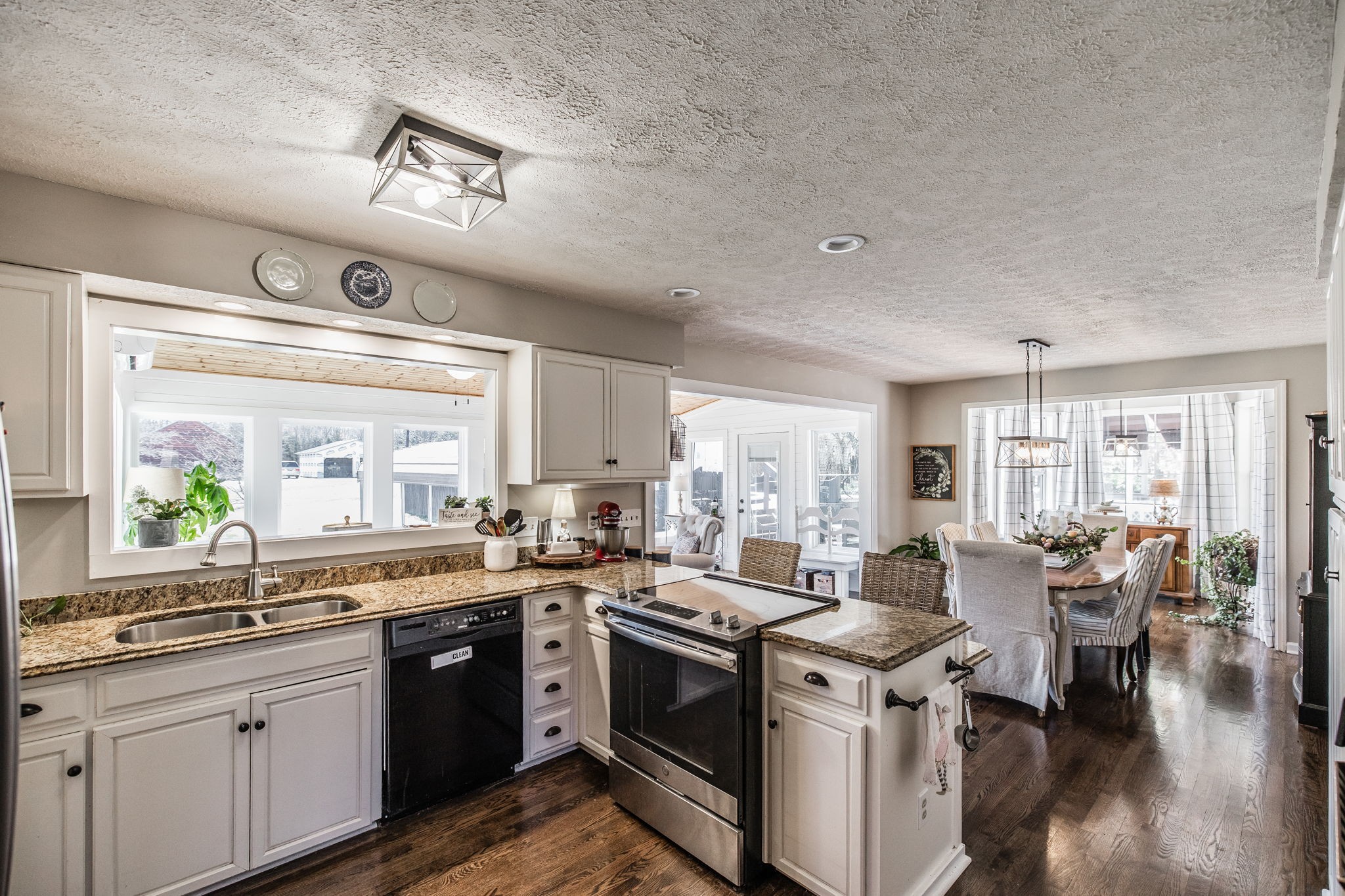 6761 Hall Road Greenbrier, TN 37073 - Photo 38 of 85 a view of a kitchen counter top space a sink and wooden floor
