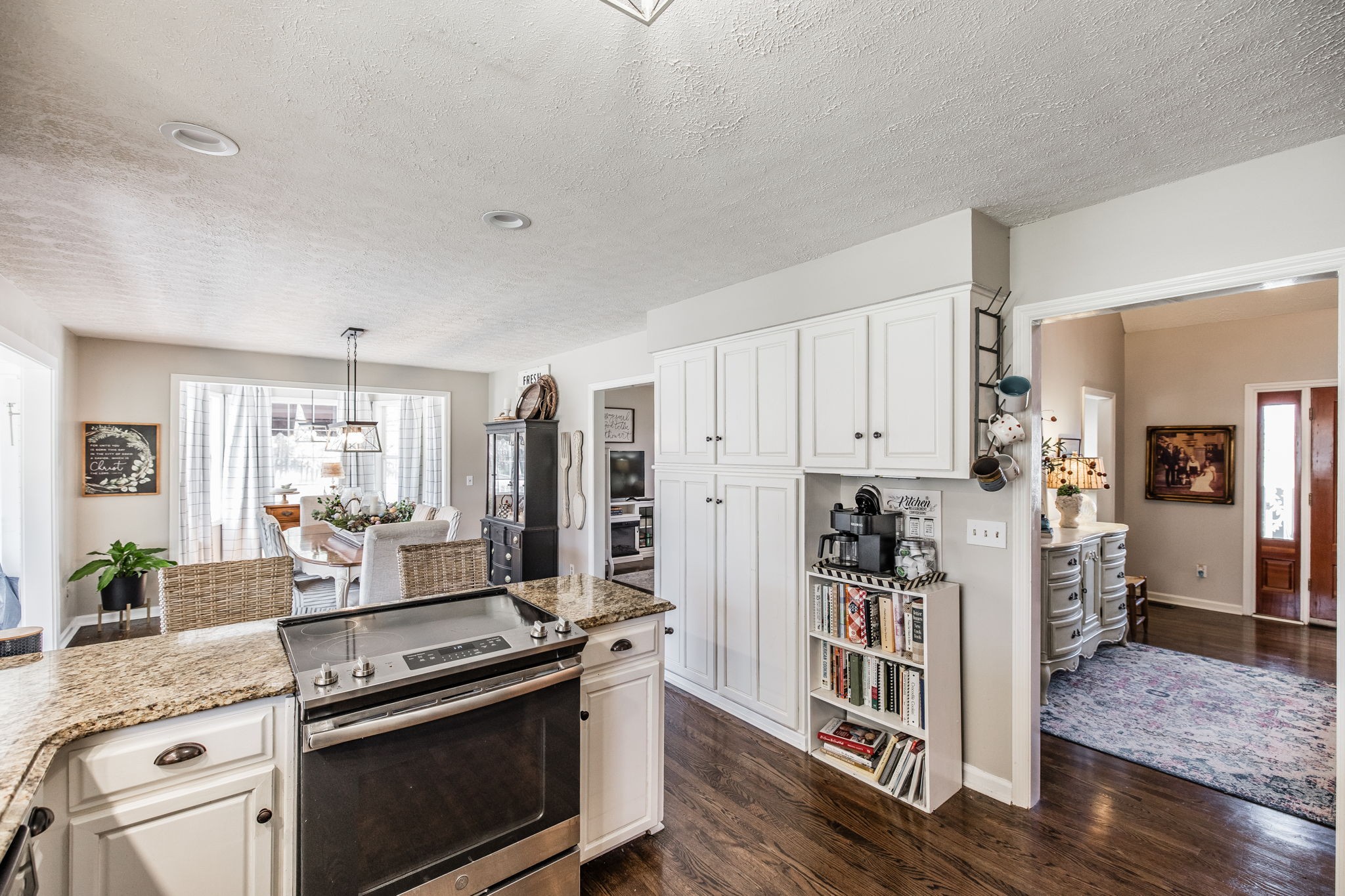 6761 Hall Road Greenbrier, TN 37073 - Photo 42 of 85 a kitchen with stainless steel appliances granite countertop a stove and a refrigerator