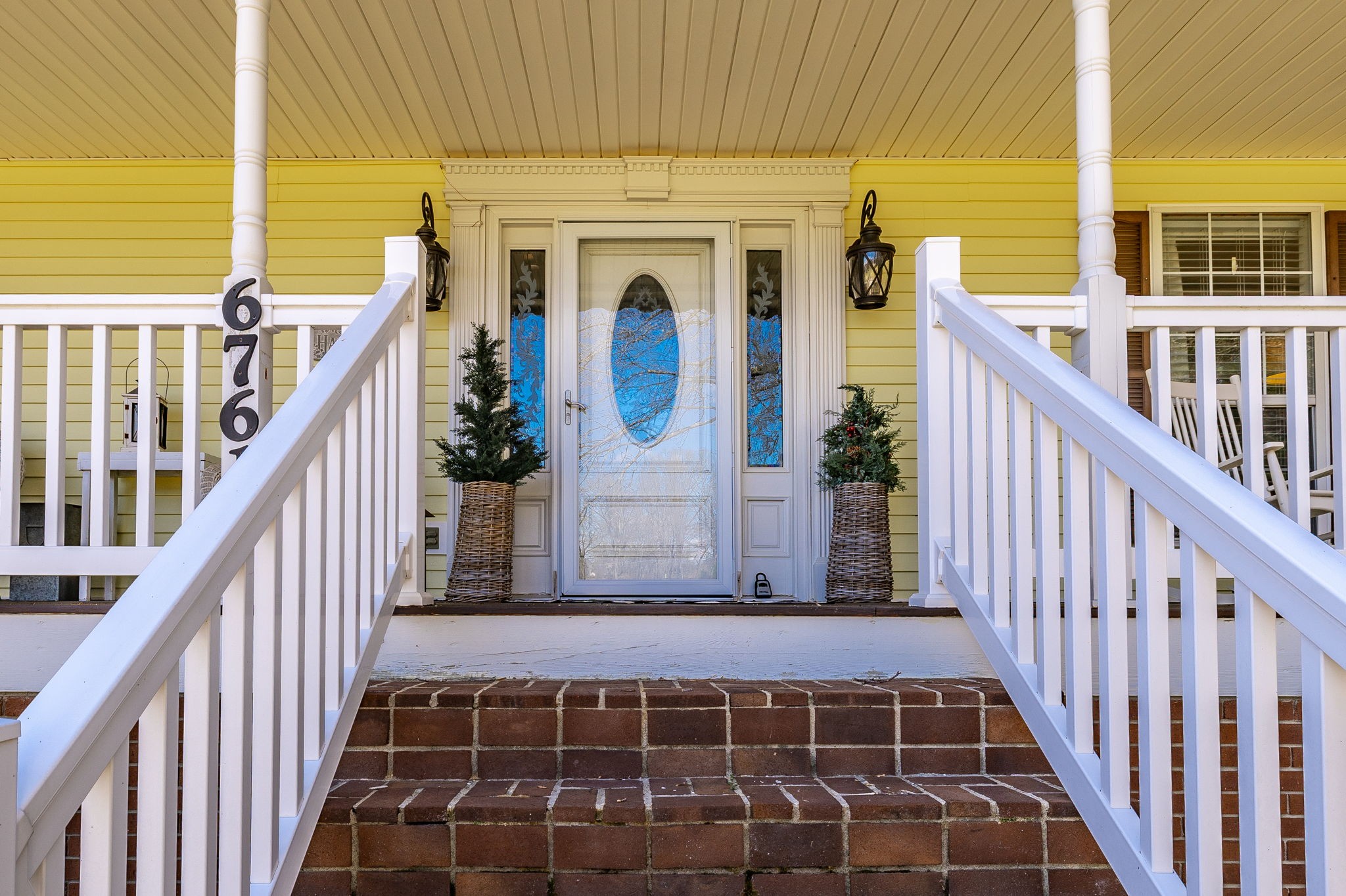 6761 Hall Road Greenbrier, TN 37073 - Photo 8 of 85 a view of a balcony with wooden floor and fence