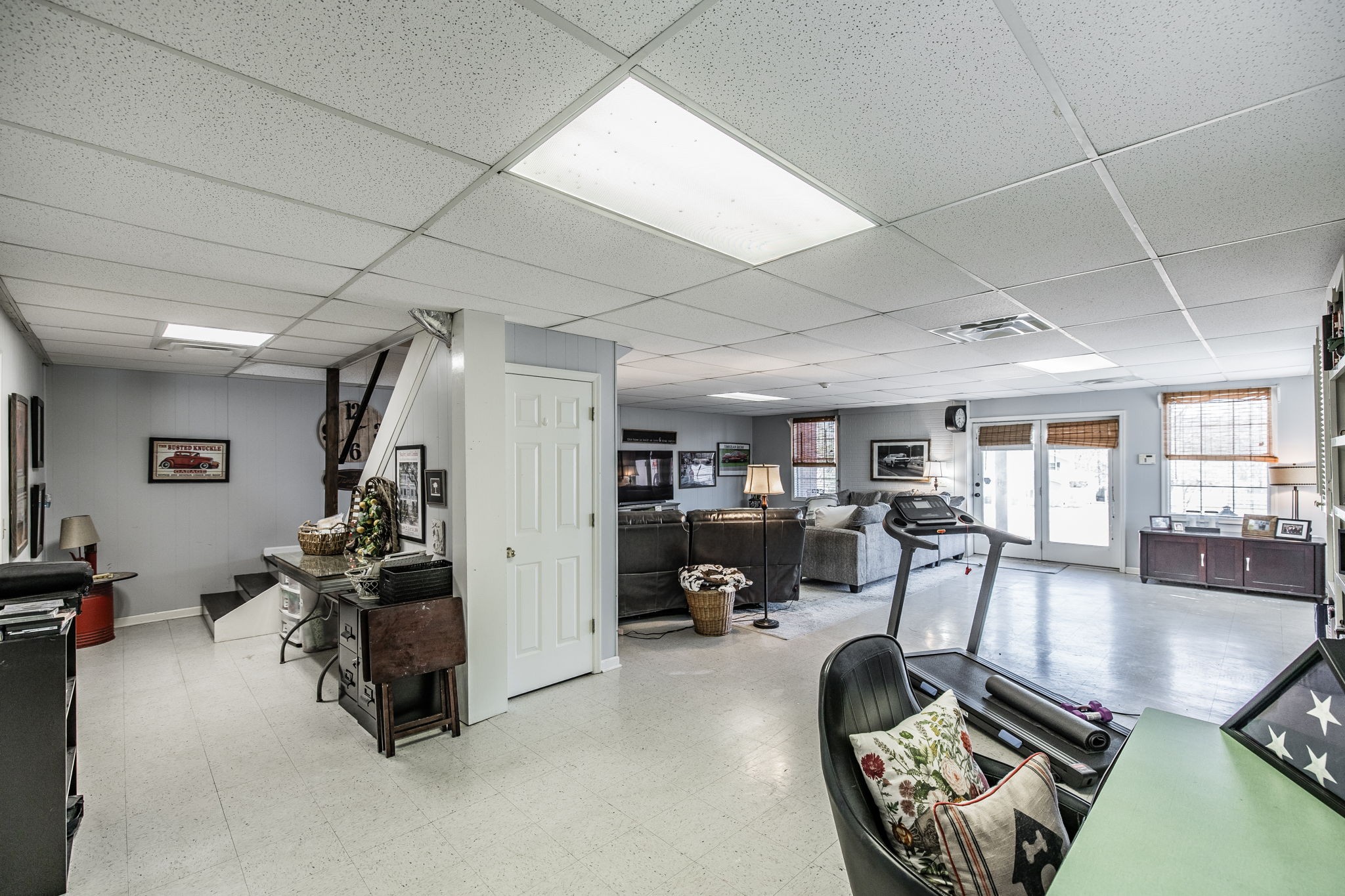 6761 Hall Road Greenbrier, TN 37073 - Photo 81 of 85 a room with gym equipment and a large window