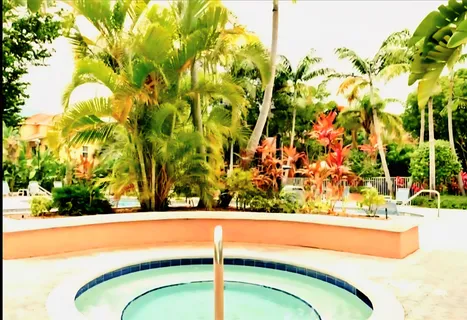 a view of swimming pool with a yard