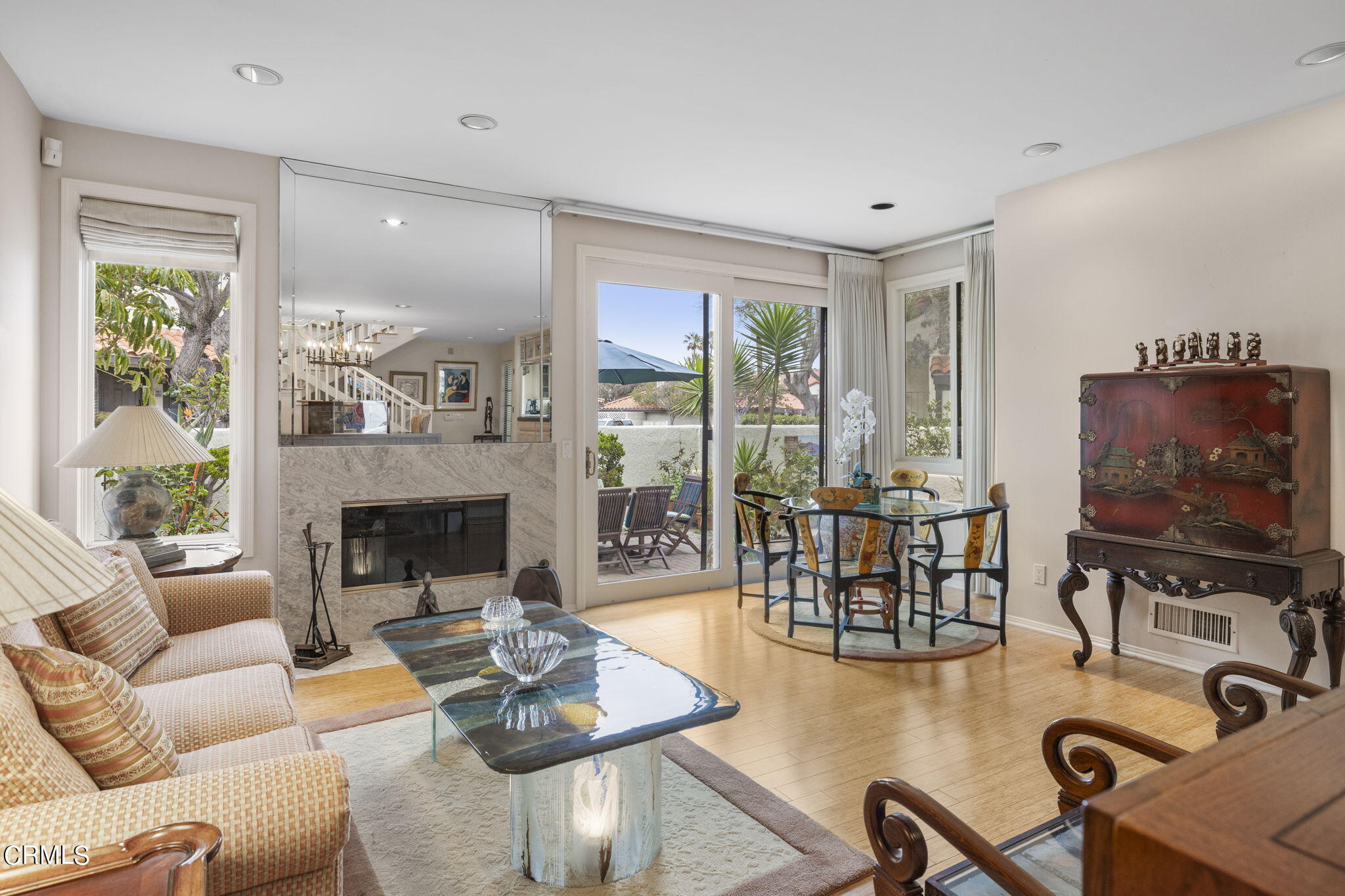 2226 Cannes Square Oxnard, CA 93035 - Photo 16 of 75 a living room with furniture a flat screen tv and a fireplace