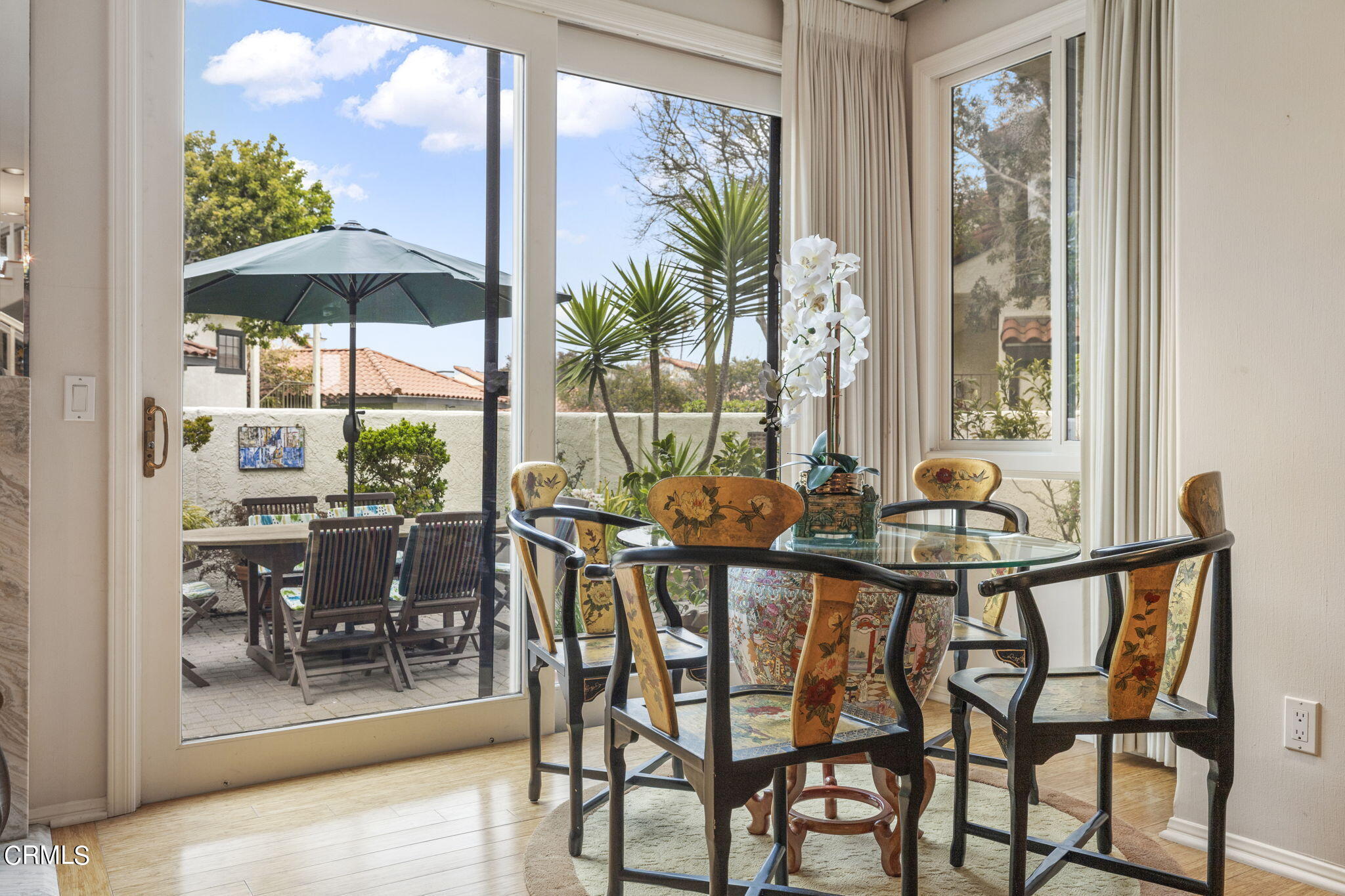 2226 Cannes Square Oxnard, CA 93035 - Photo 17 of 75 a view of a dining room with furniture window and outside view
