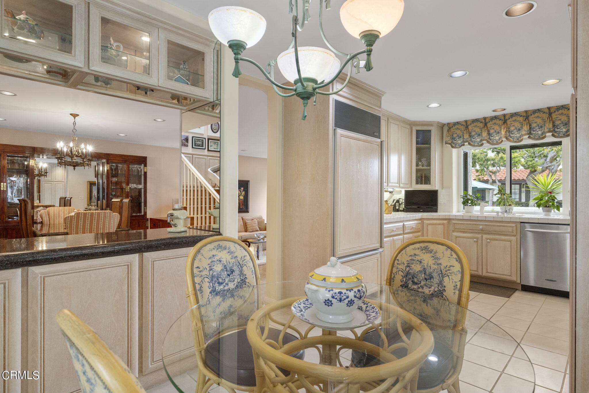 2226 Cannes Square Oxnard, CA 93035 - Photo 21 of 75 a very nice looking dining room with a chandelier