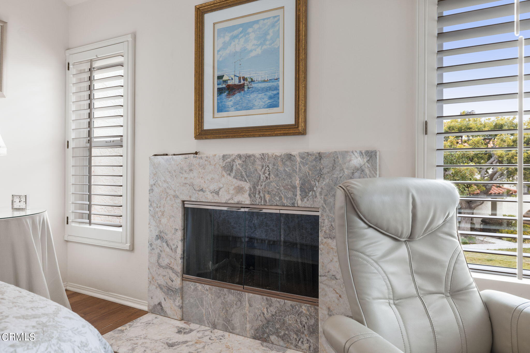 2226 Cannes Square Oxnard, CA 93035 - Photo 34 of 75 a living room with furniture and a fireplace