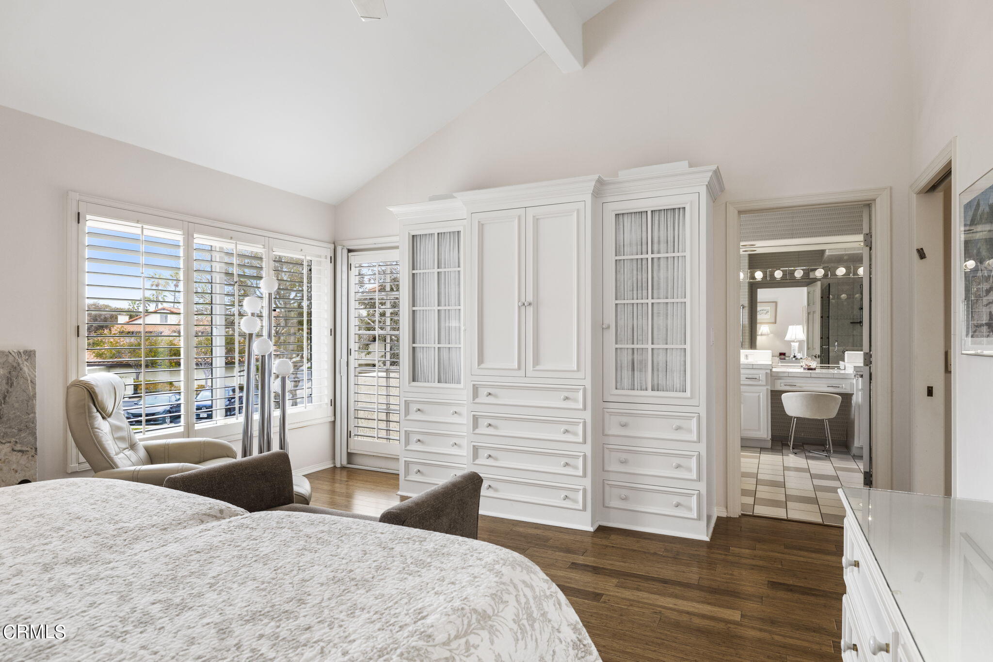 2226 Cannes Square Oxnard, CA 93035 - Photo 35 of 75 a bedroom with a bed and wooden floor