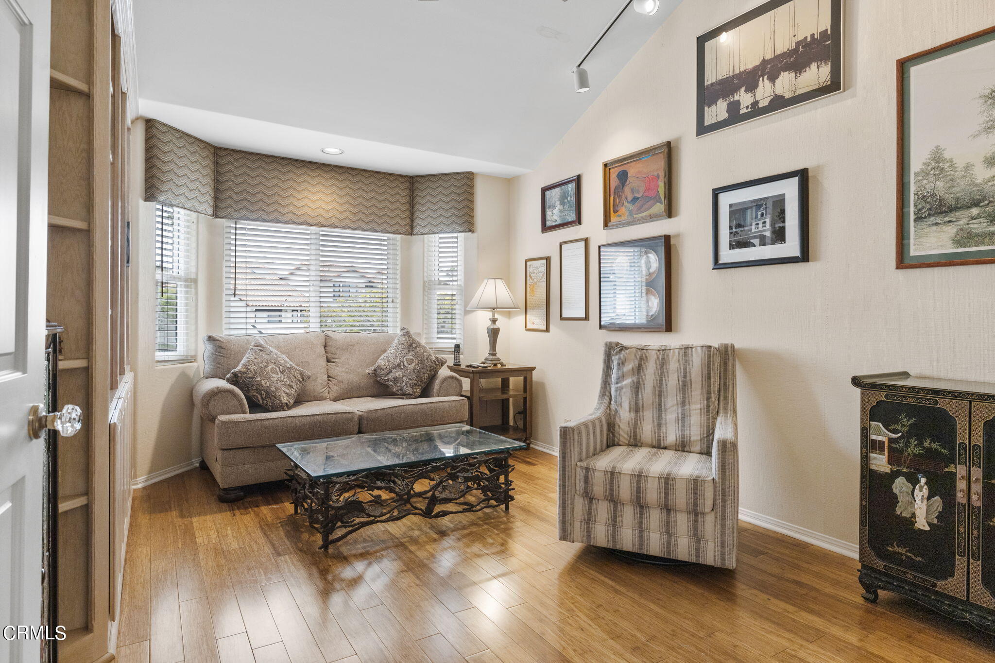 2226 Cannes Square Oxnard, CA 93035 - Photo 41 of 75 a living room with furniture and a wooden floor