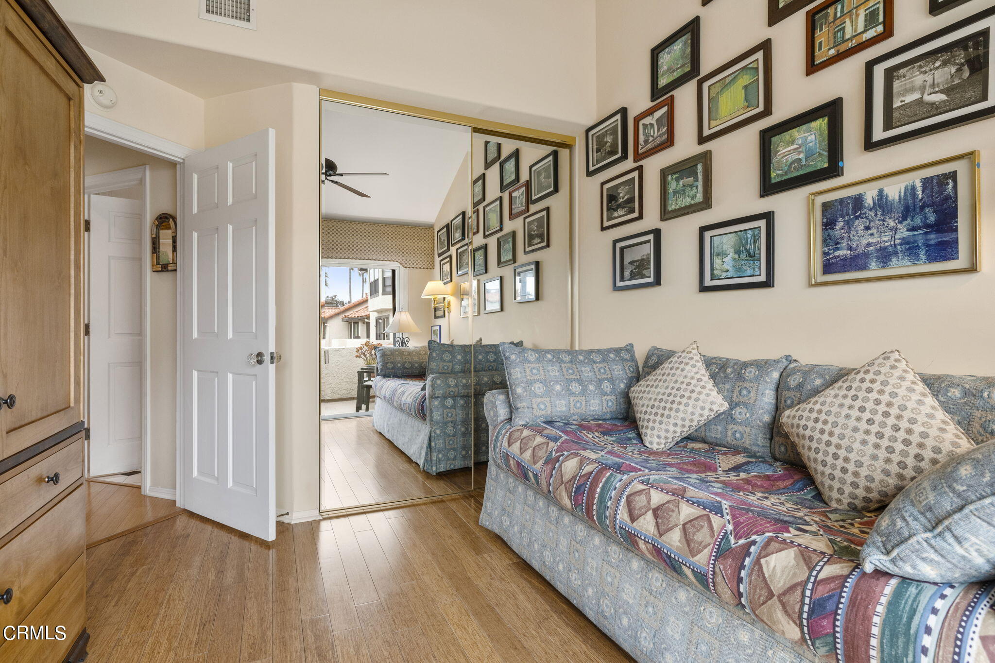 2226 Cannes Square Oxnard, CA 93035 - Photo 45 of 75 a living room with furniture and a wooden floor
