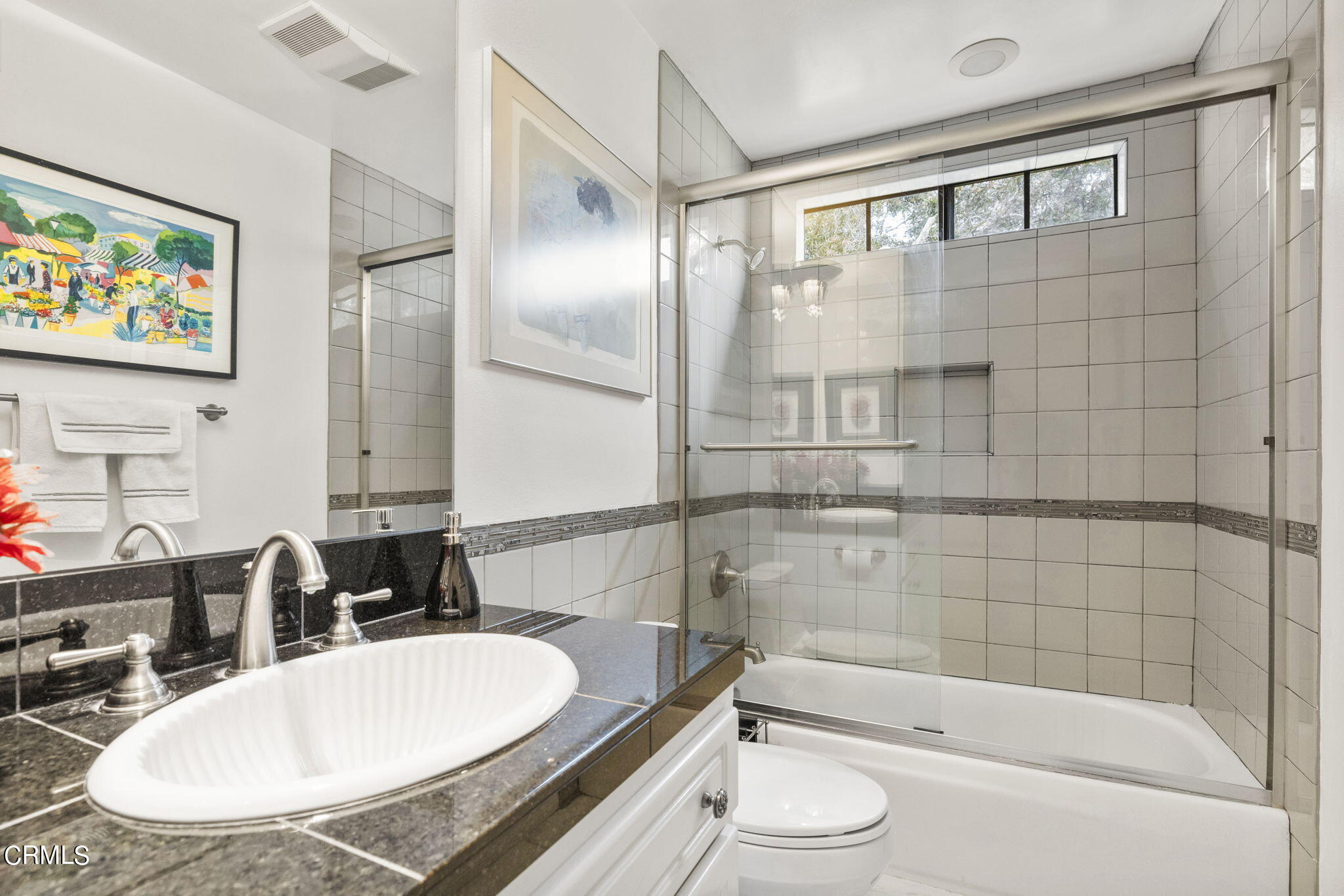 2226 Cannes Square Oxnard, CA 93035 - Photo 48 of 75 a bathroom with a granite countertop sink mirror toilet and bathtub