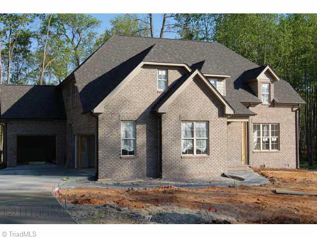 8803 East Pepper Court Oak Ridge, NC 27310 - Photo 3 of 3 Other. 2007 Parade Home in Hunters Mark. Will be complete the end of April.