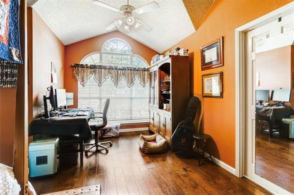 1924 Sunset Path Lewisville, TX 75067 - Photo 18 of 37 a view of a livingroom with furniture and a chandelier