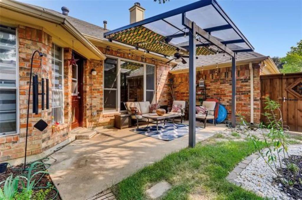 1924 Sunset Path Lewisville, TX 75067 - Photo 29 of 37 a view of a building with sitting area