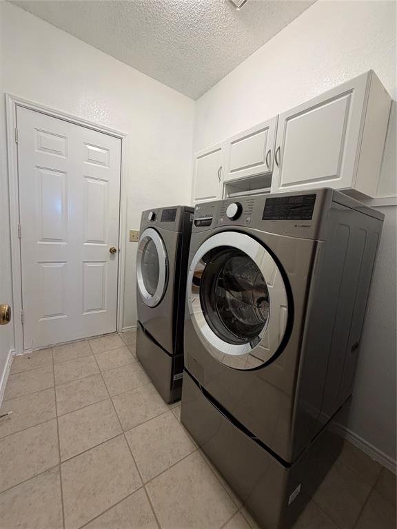 1924 Sunset Path Lewisville, TX 75067 - Photo 33 of 37 a utility room with dryer and washer