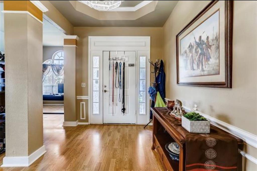 1924 Sunset Path Lewisville, TX 75067 - Photo 7 of 37 a view of an entryway with wooden floor