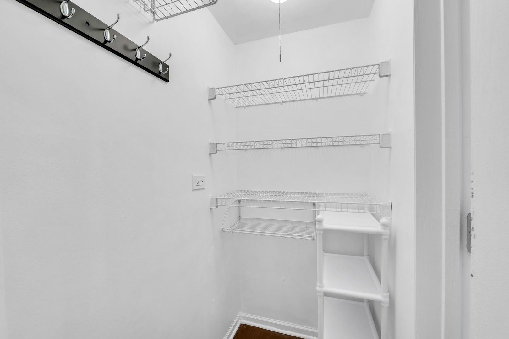 1330 Perry Street, Unit 504 Des Plaines, IL 60016 - Photo 21 of 32 a view of walk in closet with empty racks