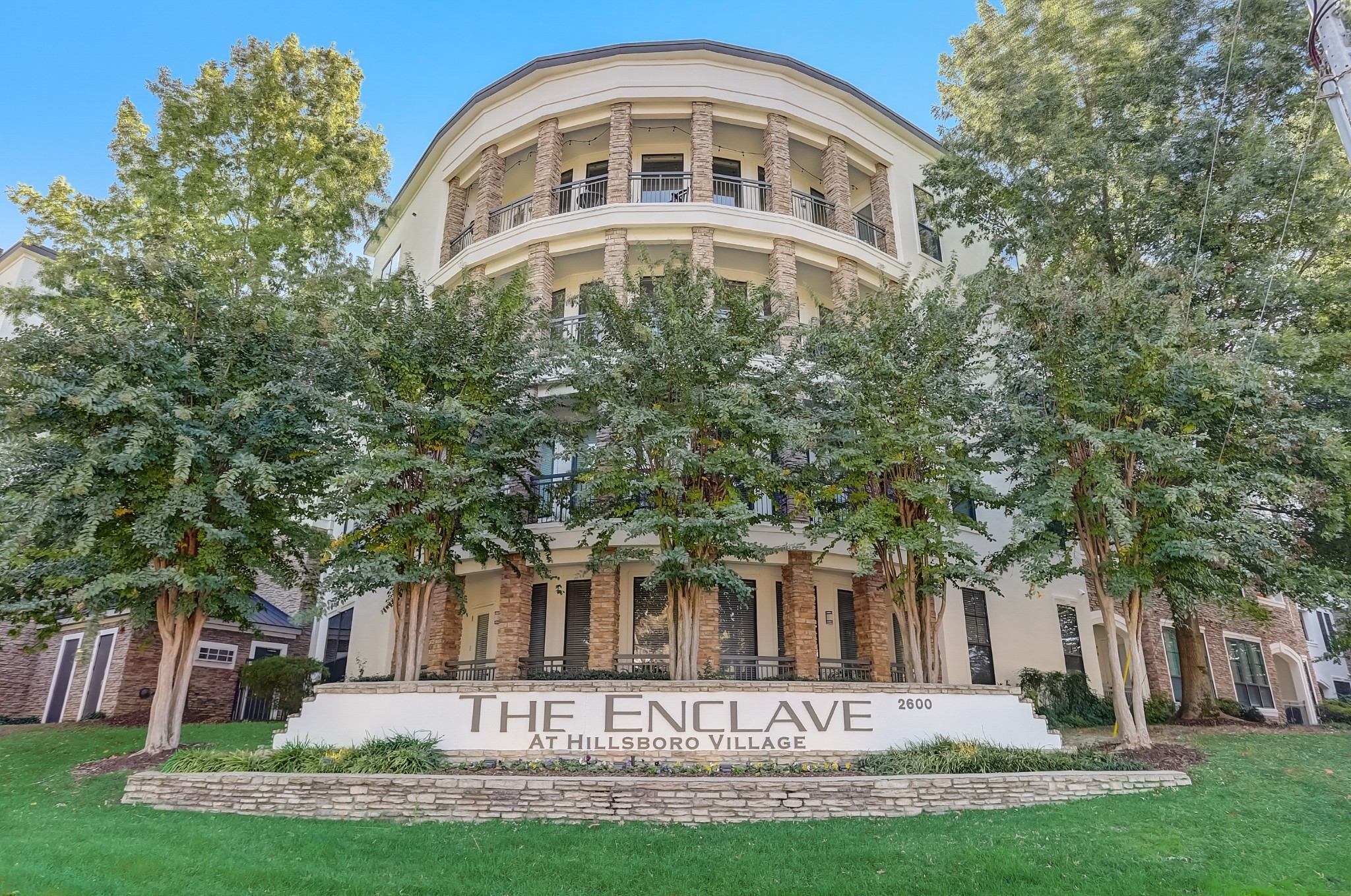 2600 Hillsboro Pike, Unit 115 Nashville, TN 37212 - Photo 16 of 29 front view of a house with a yard