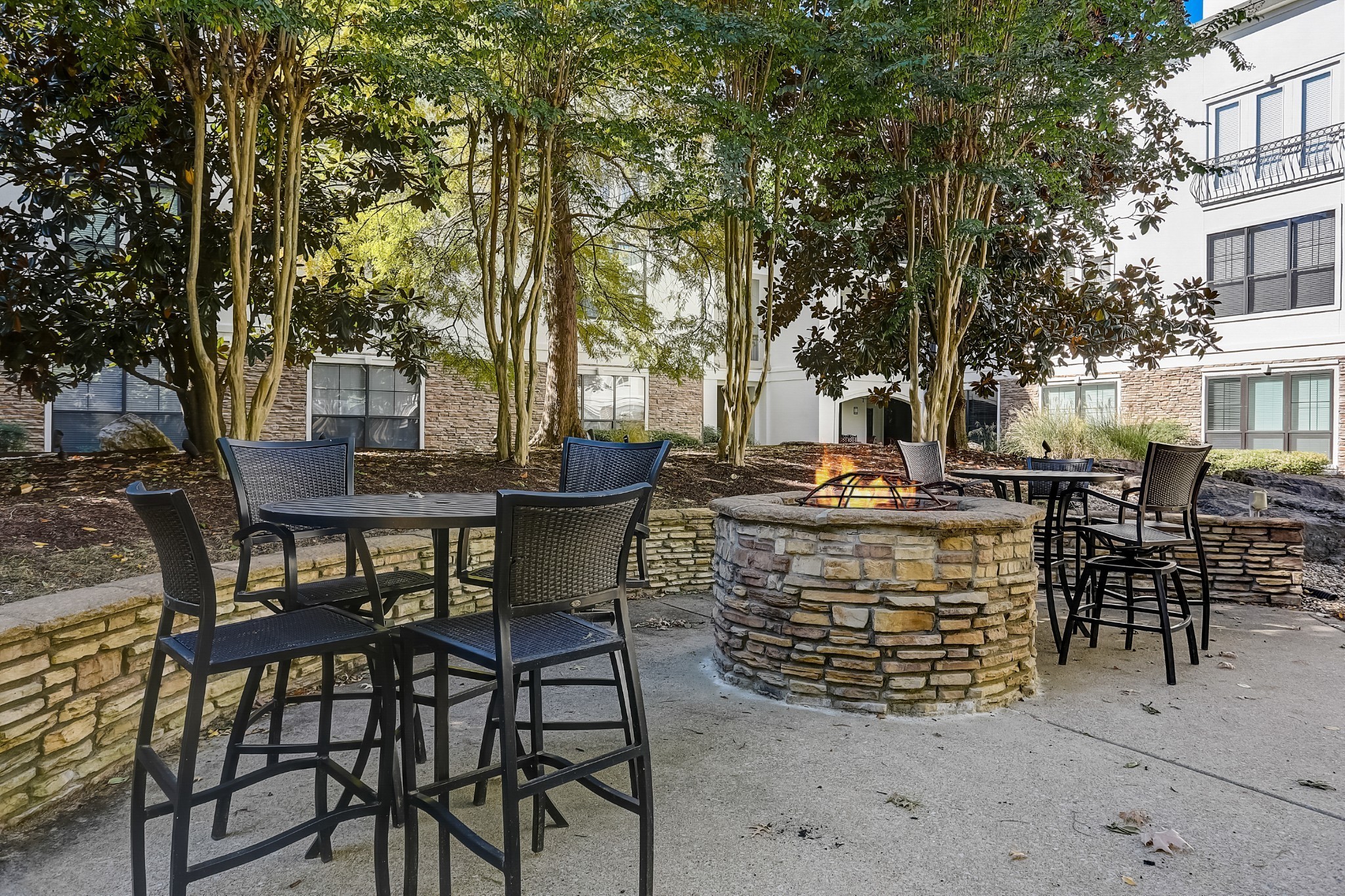 2600 Hillsboro Pike, Unit 115 Nashville, TN 37212 - Photo 19 of 29 a view of an outdoor space with table and chairs