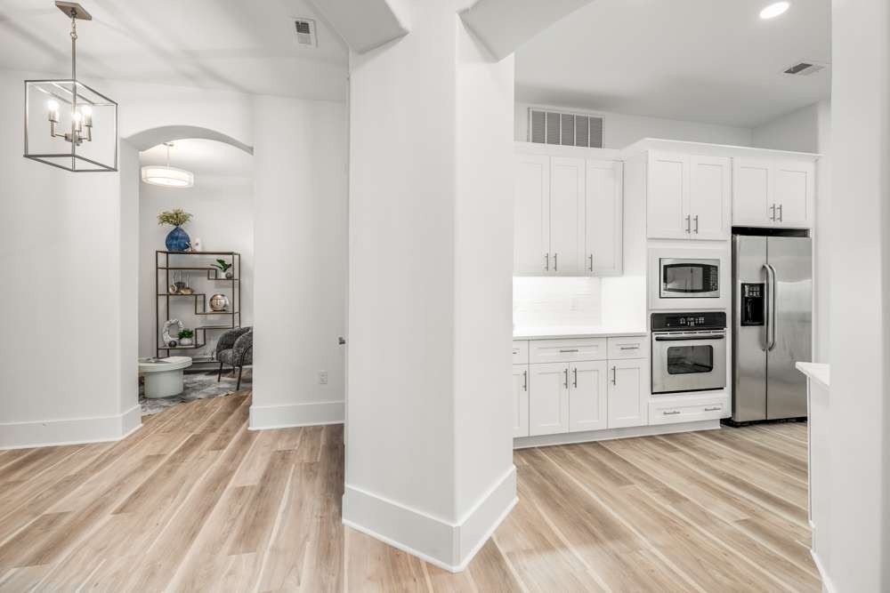 2600 Hillsboro Pike, Unit 115 Nashville, TN 37212 - Photo 2 of 29 a kitchen with stainless steel appliances a refrigerator and a stove top oven
