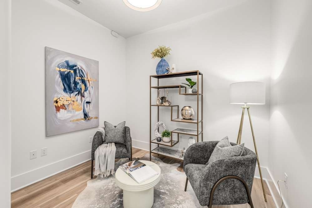 2600 Hillsboro Pike, Unit 115 Nashville, TN 37212 - Photo 3 of 29 a living room with furniture and a painting