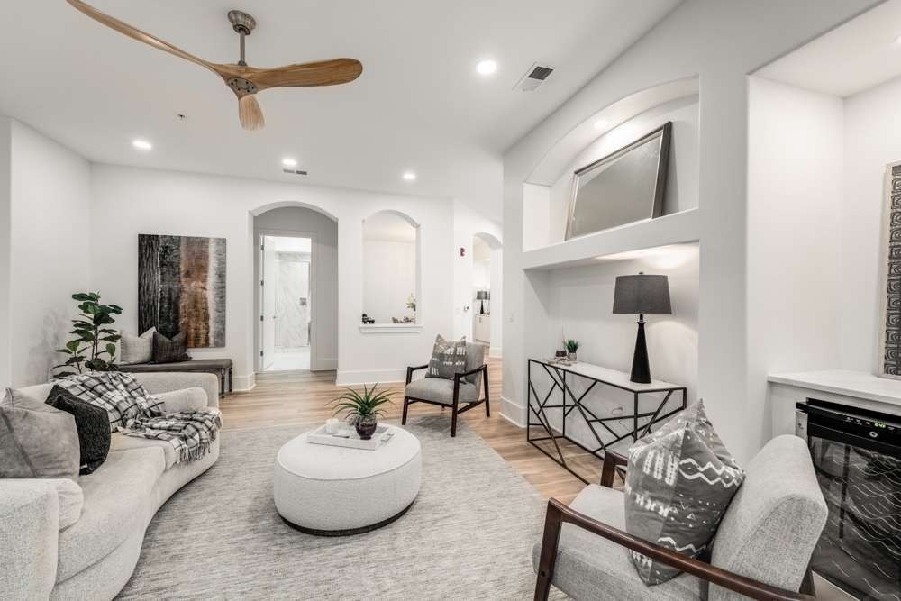 2600 Hillsboro Pike, Unit 115 Nashville, TN 37212 - Photo 9 of 29 a living room with furniture and a wooden floor