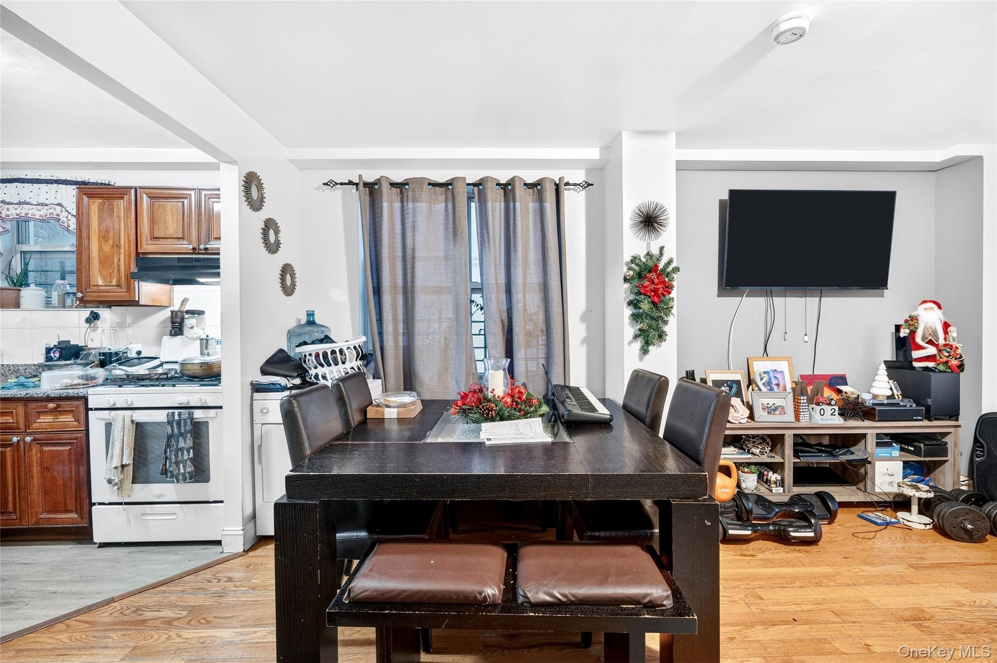1459 Rosedale Avenue Bronx, NY 10460 - Photo 14 of 37 a view of a dining room with furniture and a kitchen