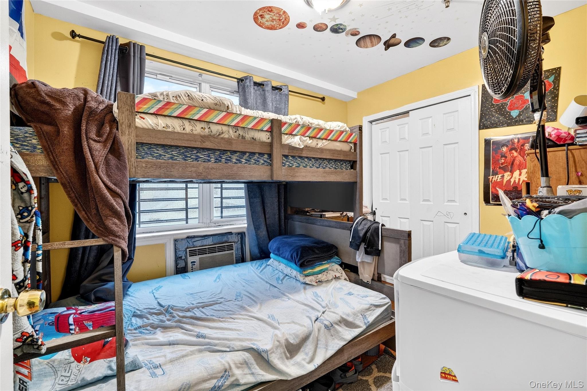 1459 Rosedale Avenue Bronx, NY 10460 - Photo 20 of 37 a bedroom with a bed and a tv