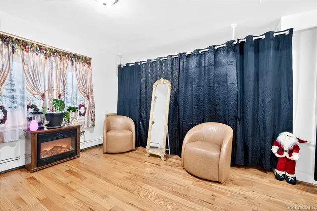 a room with furniture a window and a chair