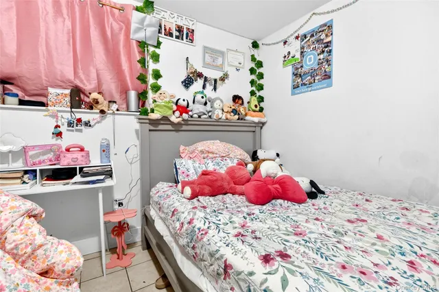 a bedroom with a bed and closet