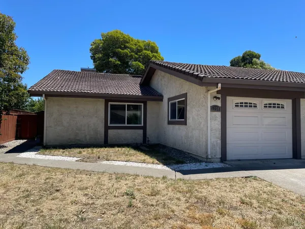 a house that has a window in front of it