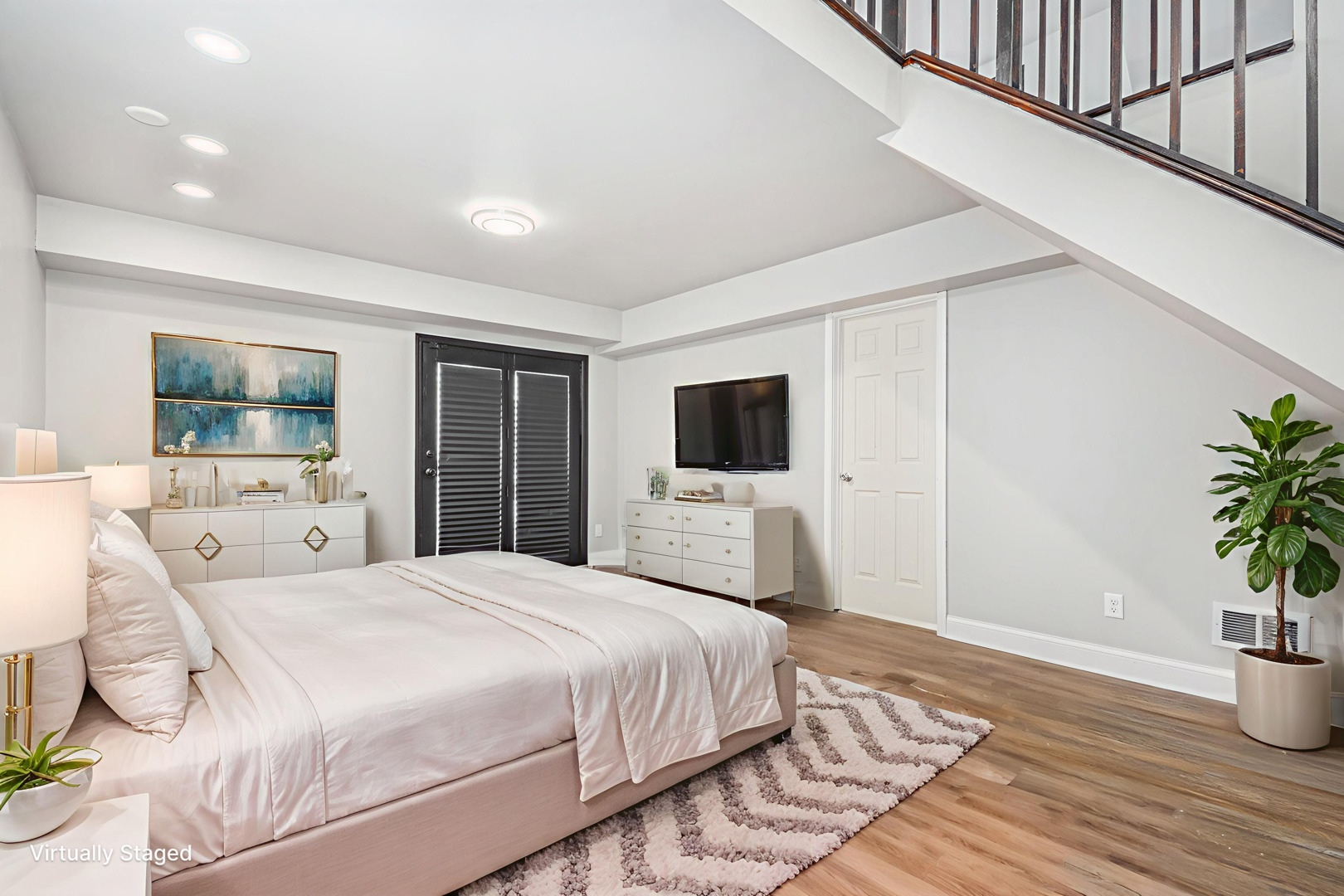 353 202nd Street Chicago Heights, IL 60411 - Photo 12 of 33 a bedroom with a bed a flat screen tv and a potted plant