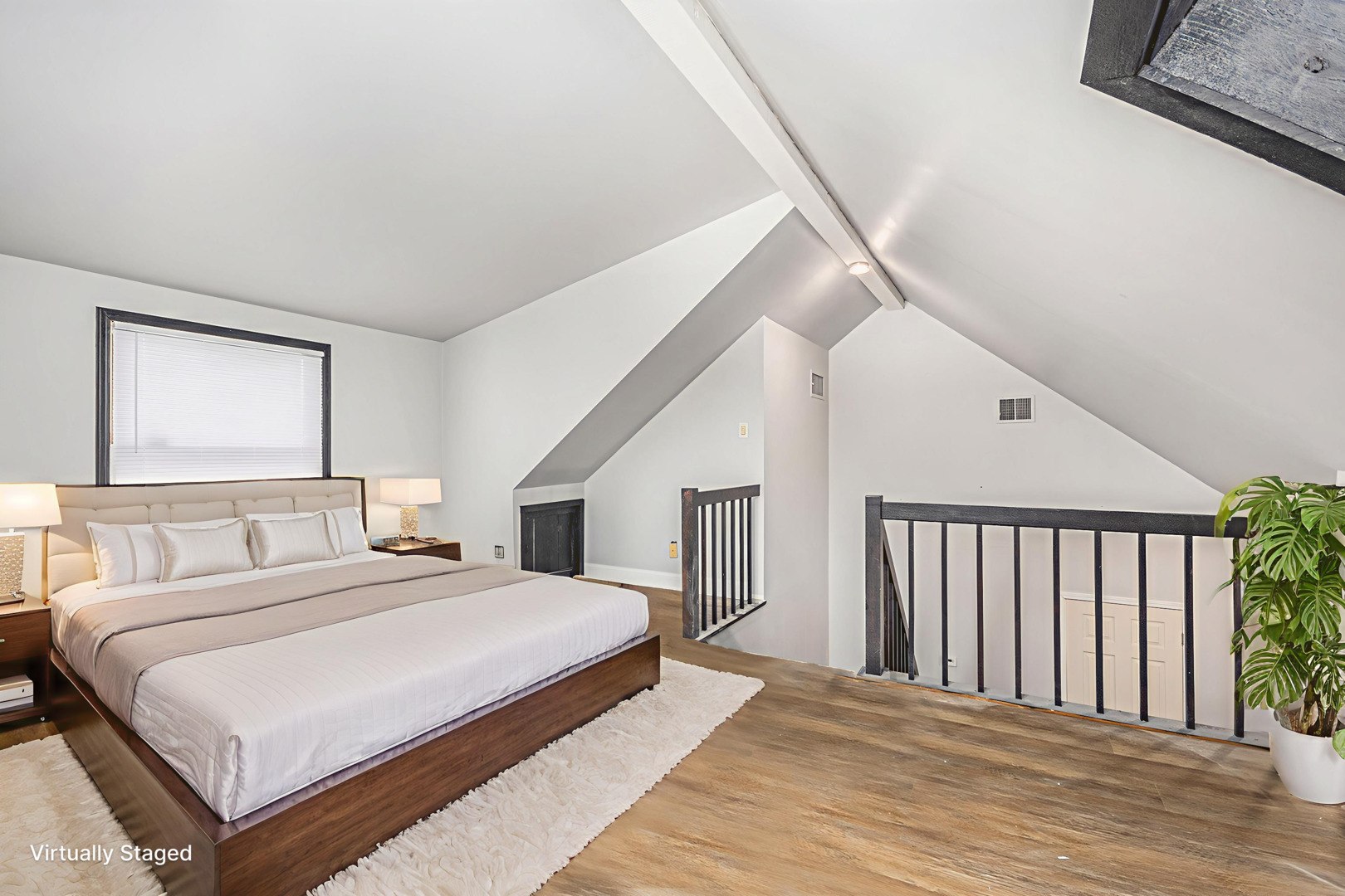 353 202nd Street Chicago Heights, IL 60411 - Photo 14 of 33 a bedroom with a large bed and a chandelier