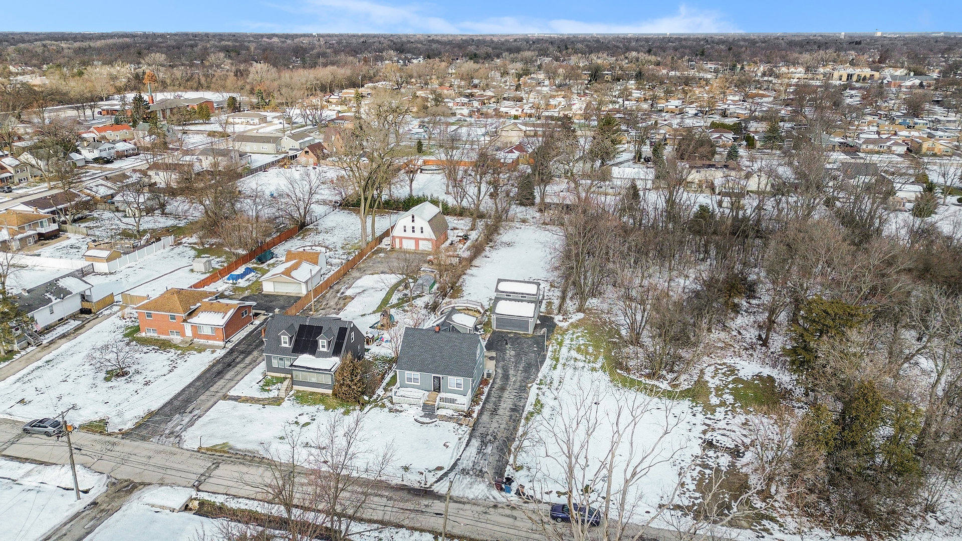 353 202nd Street Chicago Heights, IL 60411 - Photo 2 of 33 an aerial view of residential building with parking space