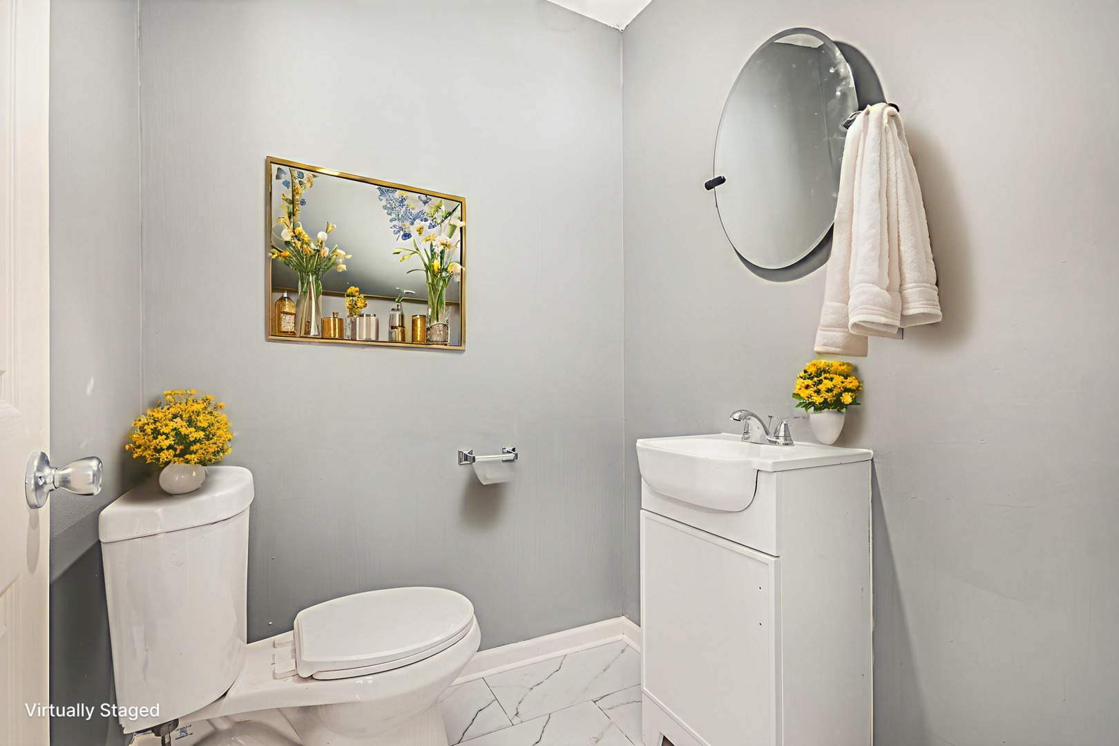 353 202nd Street Chicago Heights, IL 60411 - Photo 8 of 33 a white toilet sitting next to a bathroom sink and a mirror