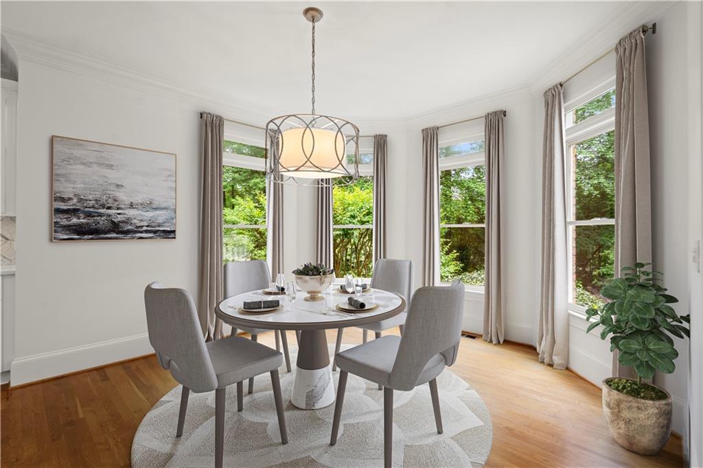 1200 Bay Pointe Terrace Alpharetta, GA 30005 - Photo 14 of 56 a view of a dining room with furniture window and wooden floor