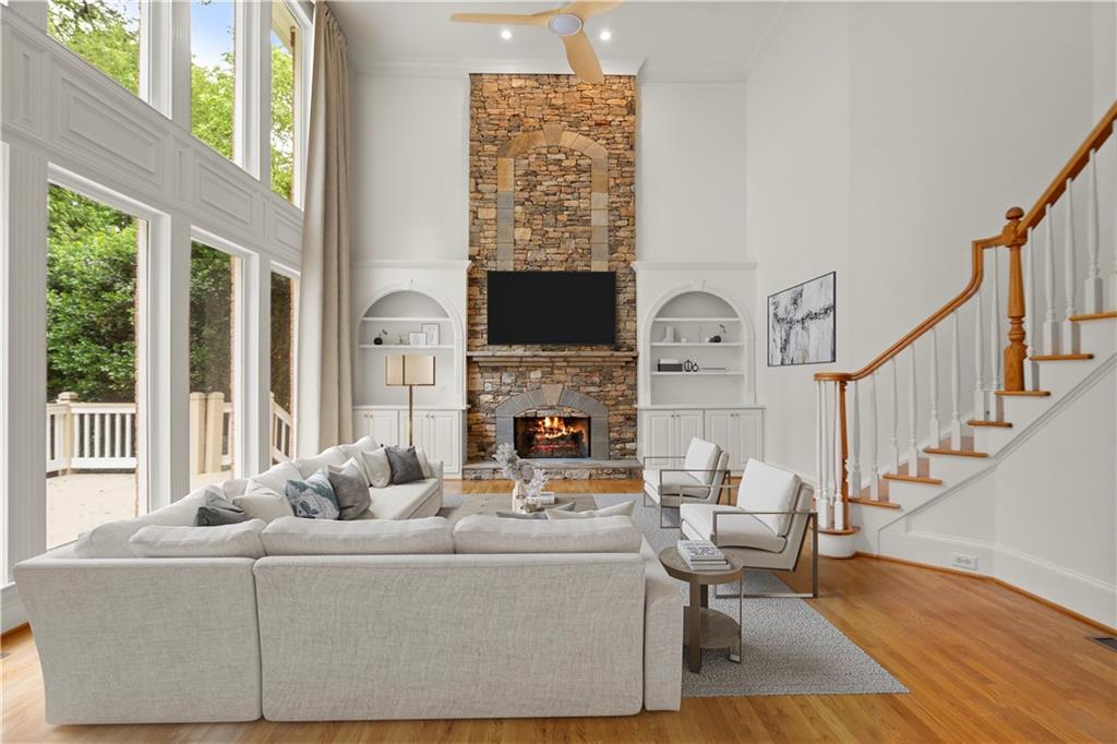 1200 Bay Pointe Terrace Alpharetta, GA 30005 - Photo 15 of 56 a living room with furniture and a fireplace