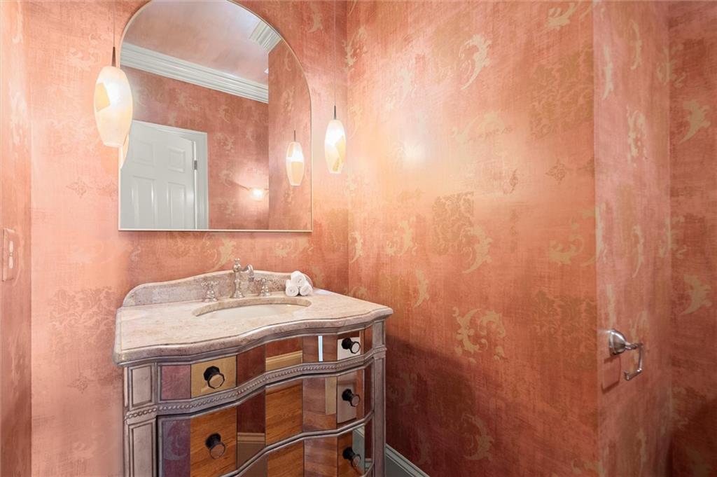 1200 Bay Pointe Terrace Alpharetta, GA 30005 - Photo 17 of 56 a bathroom with a sink and a mirror