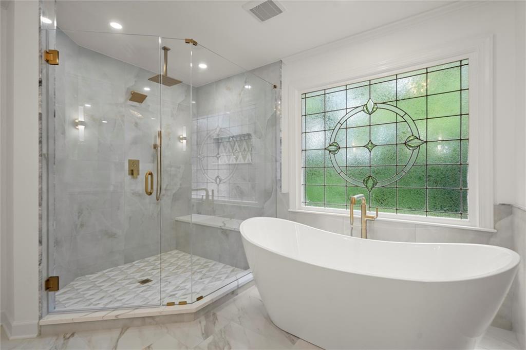 1200 Bay Pointe Terrace Alpharetta, GA 30005 - Photo 23 of 56 a white bath tub sitting next to a shower