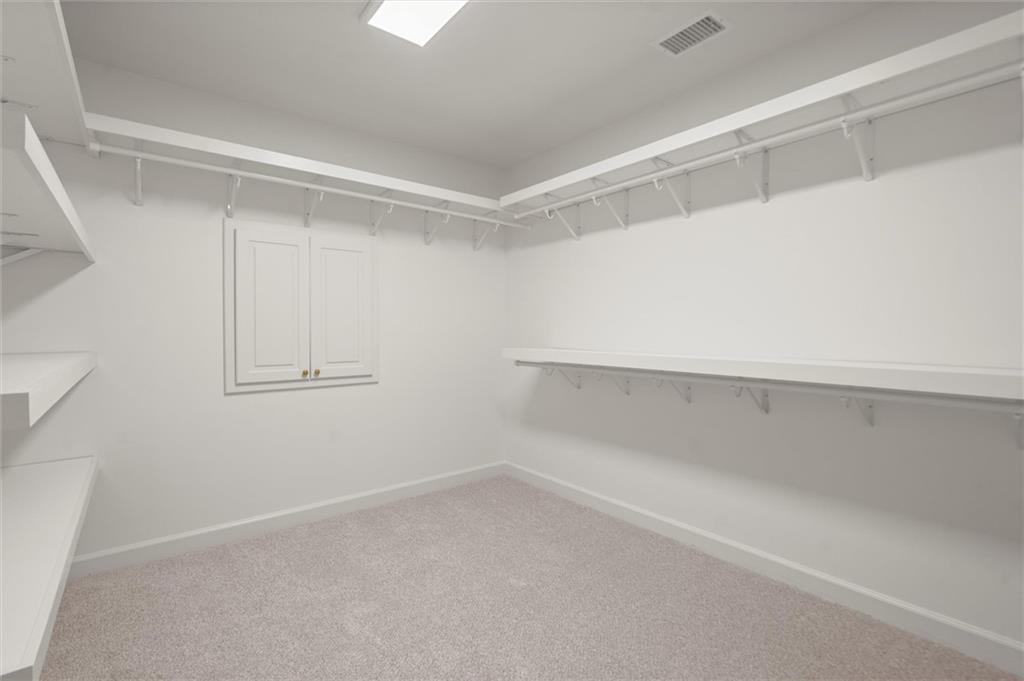 1200 Bay Pointe Terrace Alpharetta, GA 30005 - Photo 24 of 56 a view of an empty walk in closet