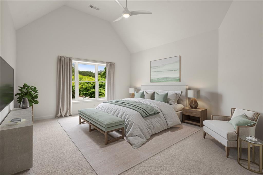 1200 Bay Pointe Terrace Alpharetta, GA 30005 - Photo 25 of 56 a spacious bedroom with a bed and a couch