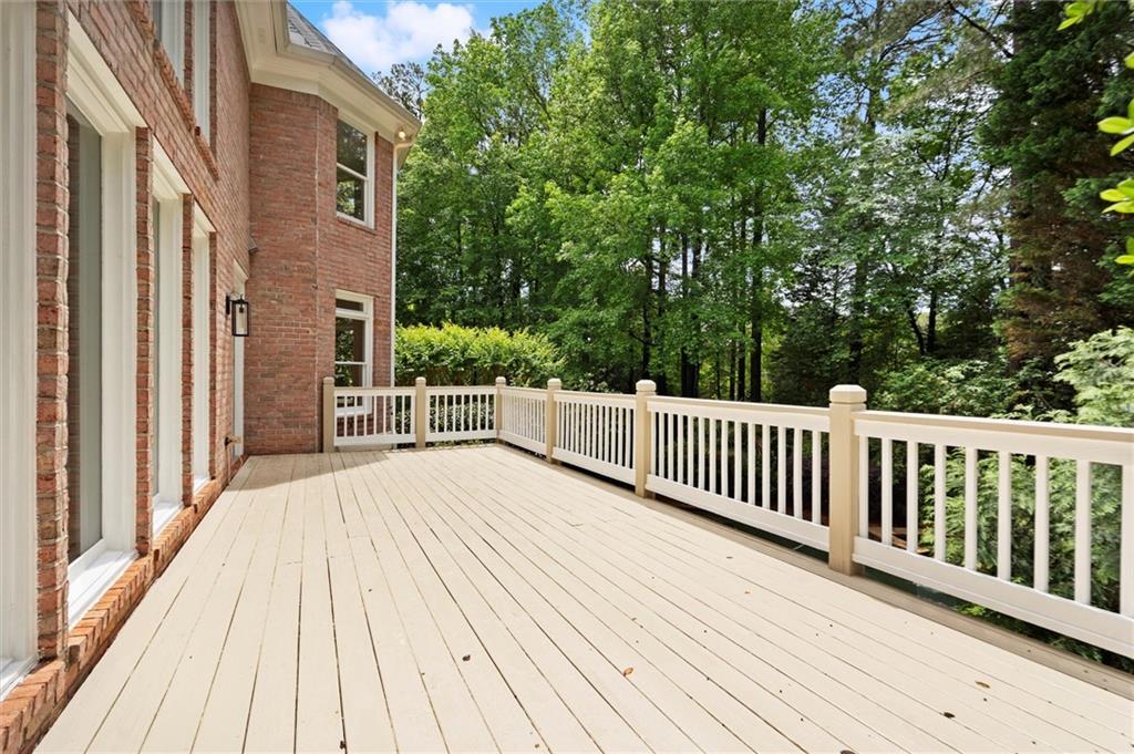 1200 Bay Pointe Terrace Alpharetta, GA 30005 - Photo 30 of 56 a view of backyard with deck and wooden floor