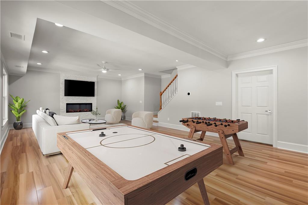 1200 Bay Pointe Terrace Alpharetta, GA 30005 - Photo 34 of 56 a view of a dining room with furniture and wooden floor