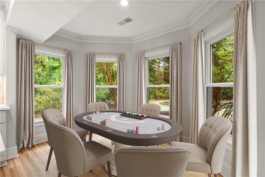 1200 Bay Pointe Terrace Alpharetta, GA 30005 - Photo 38 of 56 a view of a dining room with furniture window and outside view